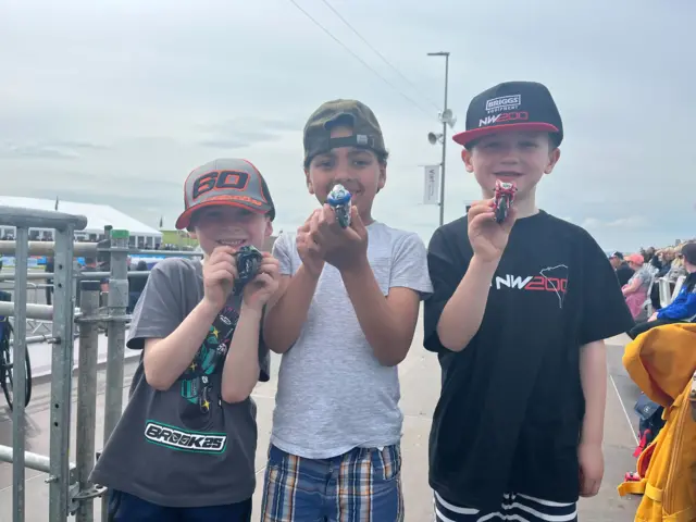 Children pose for a photo at the North West 200