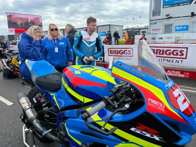 Riders waiting on the grid