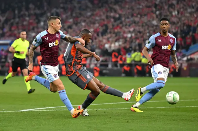 Ayoub El Kaabi of Olympiakos scores his team's first goal during the UEFA Europa Conference League 2023/24 Semi-Final first leg match between Aston Villa and Olympiacos FC at Villa Park