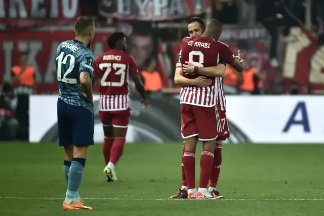 Ayoub El Kaabi of Olympiakos celebrates with Kostas Fortounis