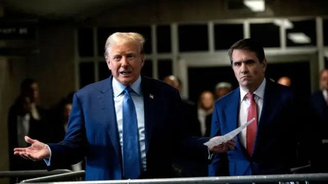 Donald Trump and Todd Blanche outside court this morning