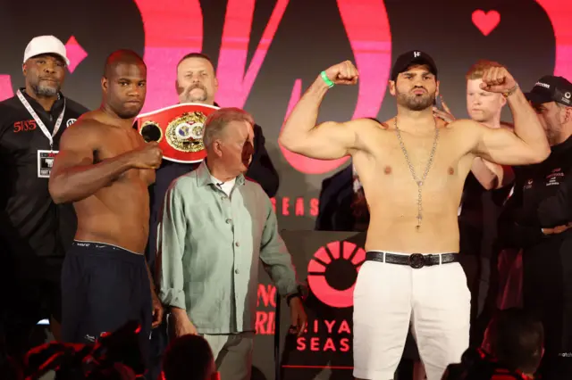 Daniel Dubois stands next to opponent Filip Hrgovic