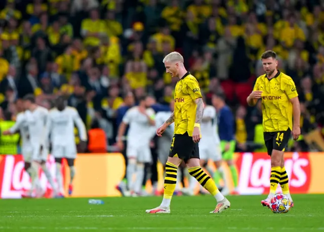 Reus storlls around the pitch after the Madrid goal