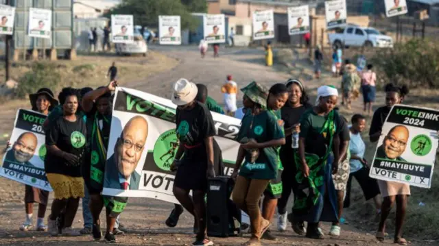 Supporters of uMkhonto weSizwe (MK) party gather outside the Ntolwane Primary School voting station in Nkandla, in rural KwaZulu-Natal - 29 May 2024