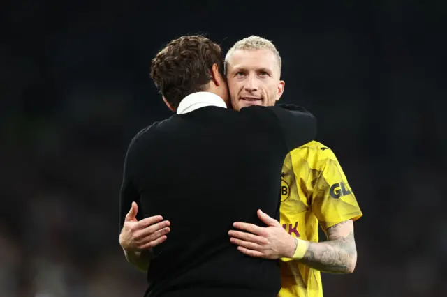 Terzic and Reus embrace at full time