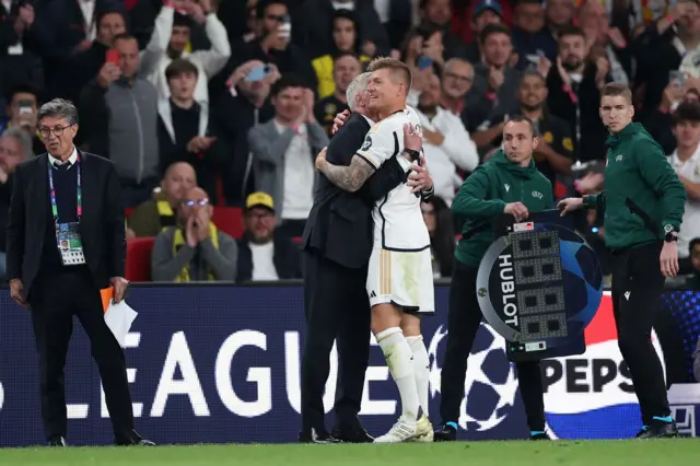 Kroos and Ancelotti embrace