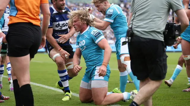 Sale's Tommy Taylor celebrates scoring his try