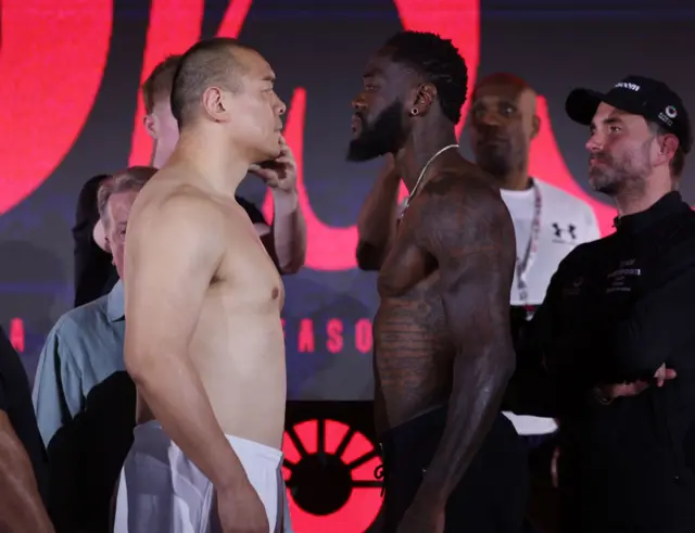 Zhilei Zhang and Deontay Wilder face off