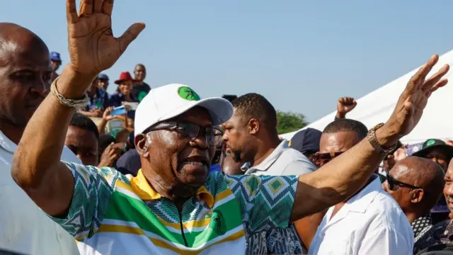 Former South African President Jacob Zuma gestures after voting during the South African elections, in Nkandla, South Africa May 29, 2024