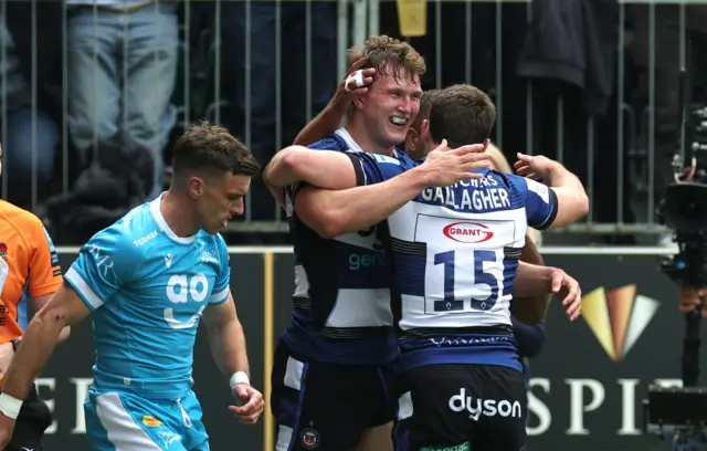 Ted Hill celebrates scoring for Bath