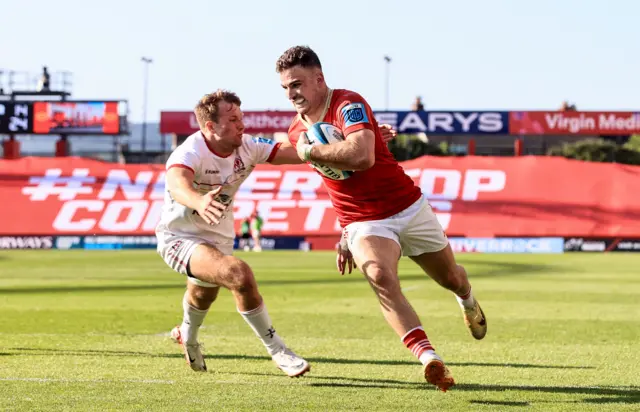 Shane Daly scores a try despite Stewart Moore