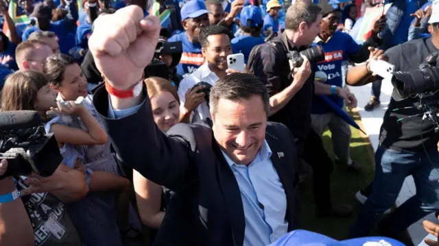 John Steenhuisen, the leader of the Democratic Alliance, greets supporters at an election rally in Benoni, South Africa May 26, 2024