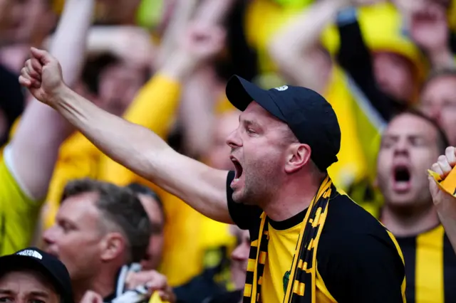 Dortmund fan leads the chants in the yellow wall