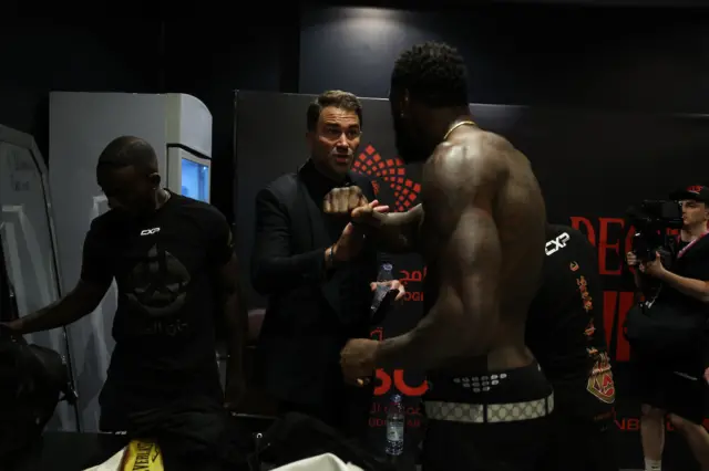 Eddie Hearn and Deontay Wilder shake hands