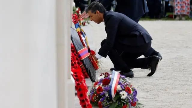 Rishi Sunak lays a wreath during the UK Ministry of Defence and the Royal British Legion's 2024 commemorative ceremony marking the 80th anniversary of the World War II D-Day Allied landings in Normandy