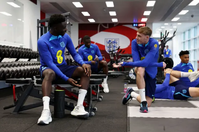 Bukayo Saka and Cole Palmer chatting