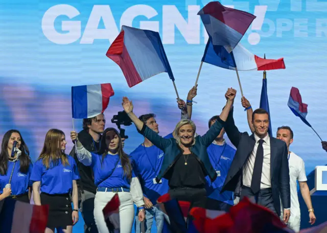 National Rally leader Marine Le Pen celebrates on stage