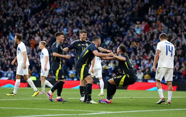 Lawrence Shankland of Scotland celebrates scoring