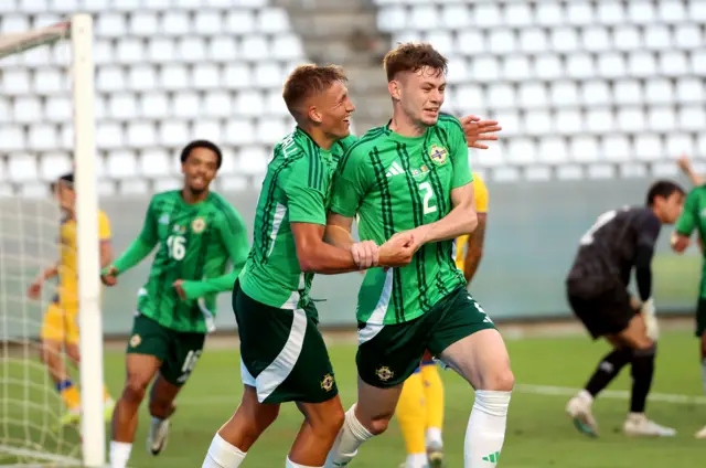 Conor Bradley celebrates