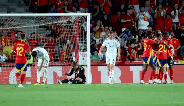 Northern Ireland players dejected after conceding a goal