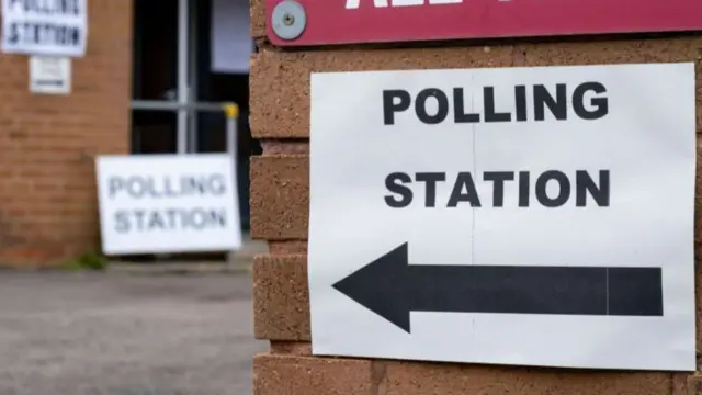 A polling station sign