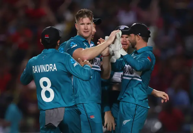 Jimmy Neesham celebrates the wicket of Brandon King