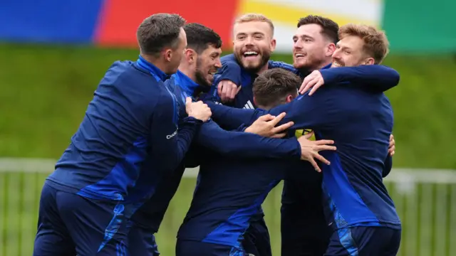 Scotland players huddle in training at Euro 2024