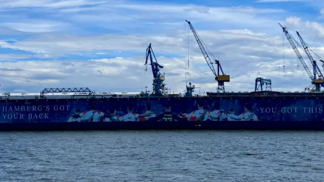 A banner on the Hamburg harbourfront showing support for the Germany national team at Euro 2024