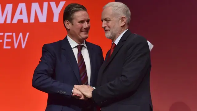 Starmer and Corbyn shake hands at a Labour campaign event