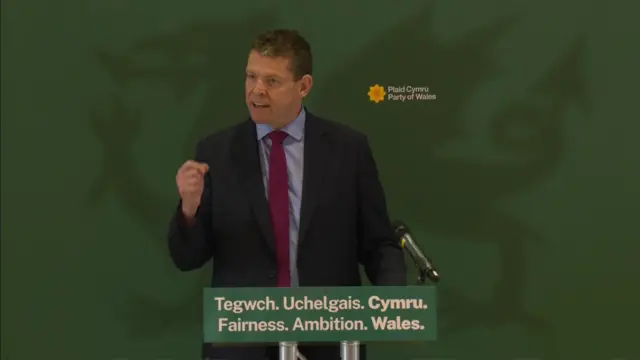 Rhun ap Iorwerth at the podium