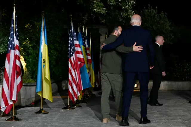 Biden and Zelensky hug at G7