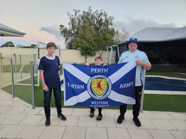 Scotland fan Gary Irvine and his sons Ross and Greg