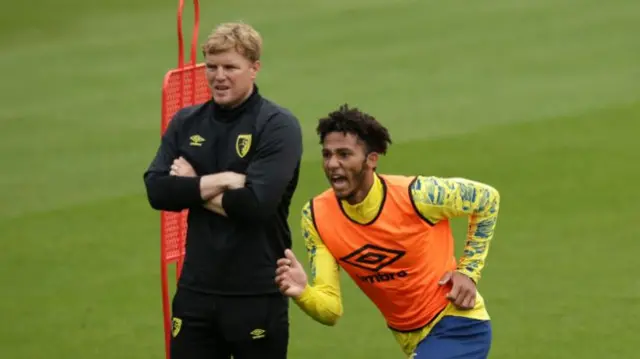 Eddie Howe and Lloyd Kelly