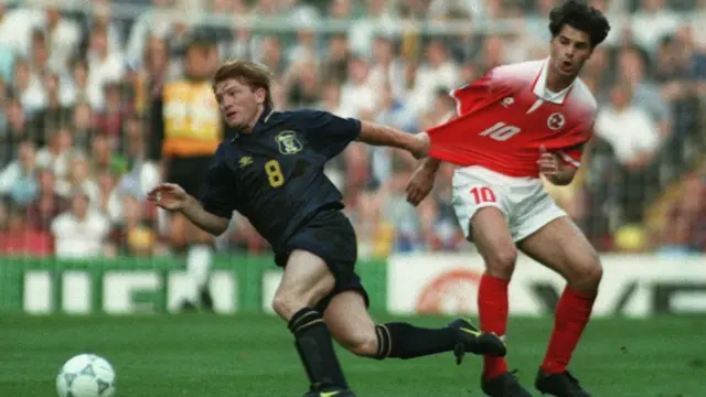 Stuart McCall playing for Scotland against Switzerland at Euro 1996