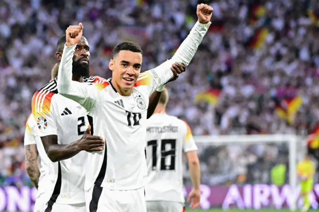 amal Musiala celebrates after scoring his team's second goal during the UEFA Euro 2024 Group A football match between Germany and Scotland at the Munich Football Arena