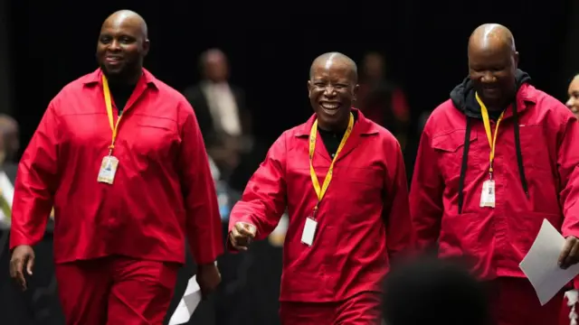 Leader of the Economic Freedom Fighters (EFF) Julius Malema walks back to his seat after being sworn in to the National Assembly during the first sitting of the National Assembly following elections at the Cape Town International Convention Center (CTICC), in Cape Town, South Africa June 14, 2024