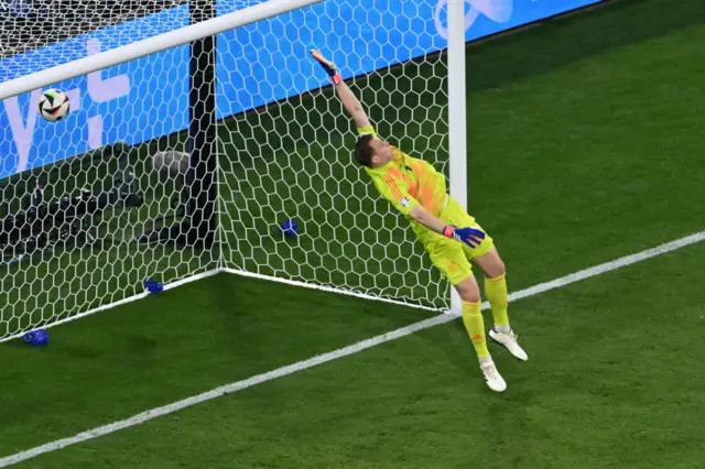 Manuel Neuer concedes an own goal from Germany's defender #02 Antonio Ruediger (not in picture) during the UEFA Euro 2024 Group A football match between Germany and Scotland at the Munich Football Arena in Munich