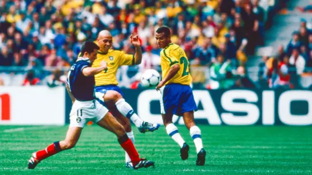 John Collins playing for Scotland against Brazil in the 1998 World Cup