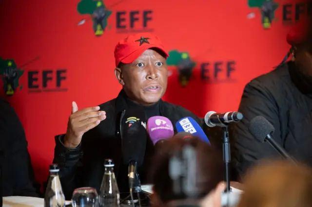 Economic Freedom Fighters (EFF) leader Julius Malema speaks during a press conference.