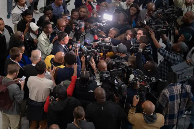 John Steenhuisen in a media scrum