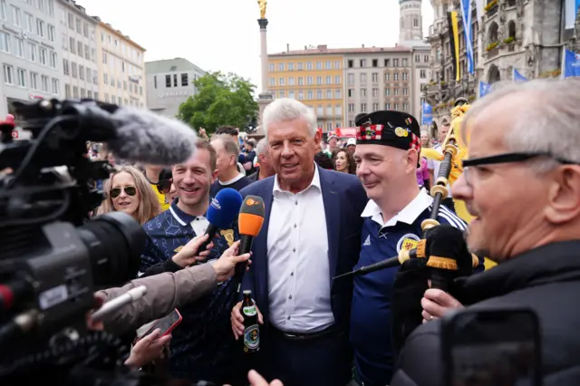 Mayor of Munich Dieter Reiter with Scotland fans at Marienplatz square