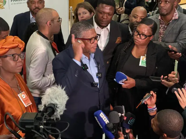 Media huddle around Fikile Mbalula