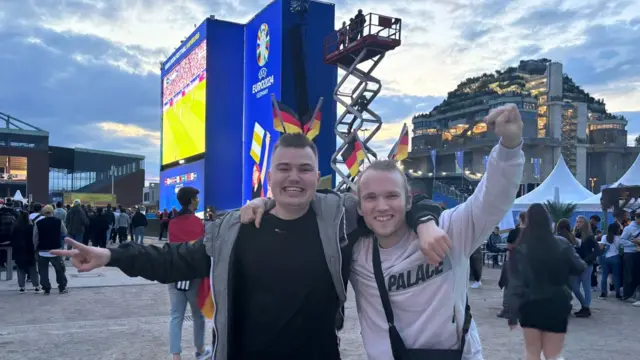 Fans celebrate Germany's victory in the Hamburg fan park