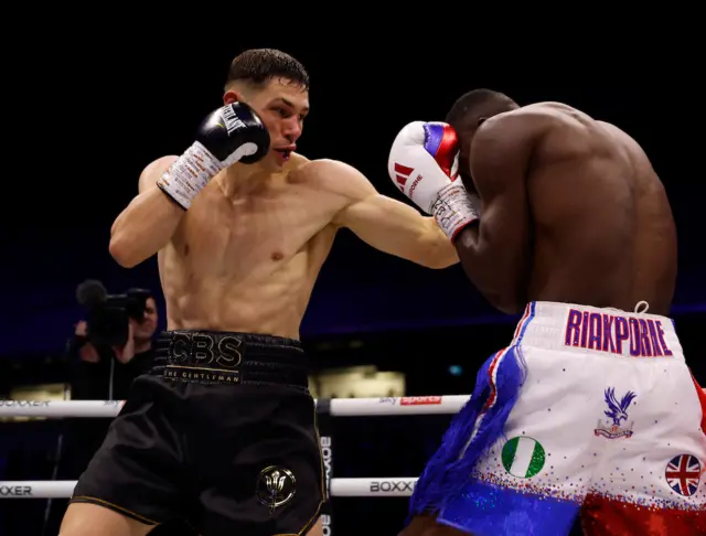 Chris Billam-Smith lands a left hook on Richard Riakporhe