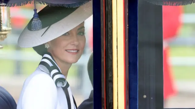 Catherine appears in a glass carriage