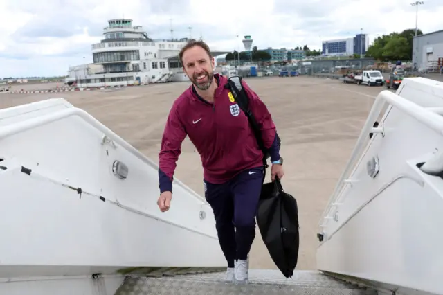 Gareth Southgate boarding plane