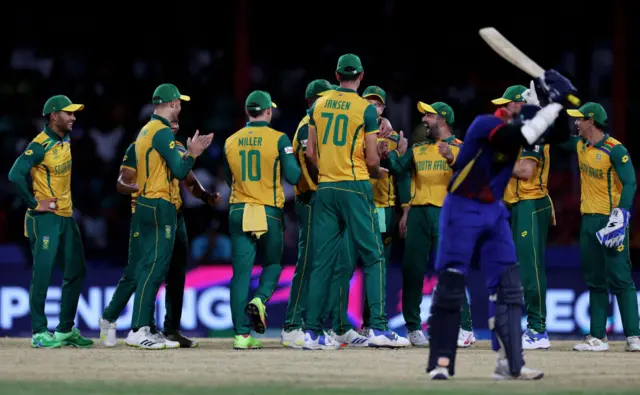 South Africa players celebrate run out to beat Nepal at T20 World Cup