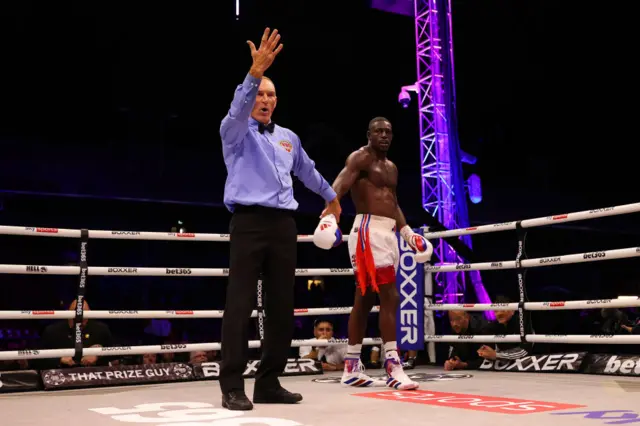 The referee deducts a point from Richard Riakporhe