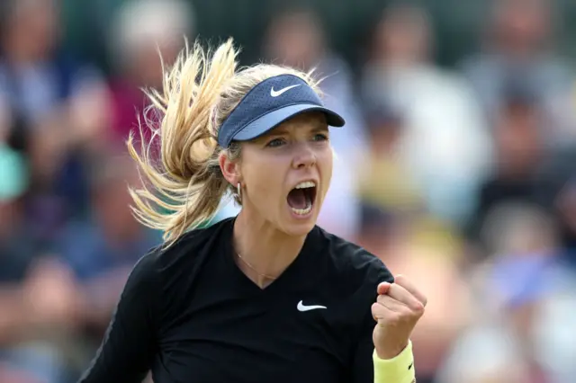 Katie Boulter animatedly shouts as she wins a point