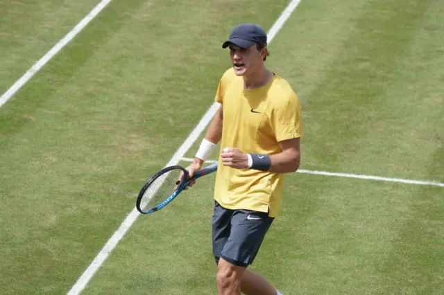 Jack Draper celebrates winning a point